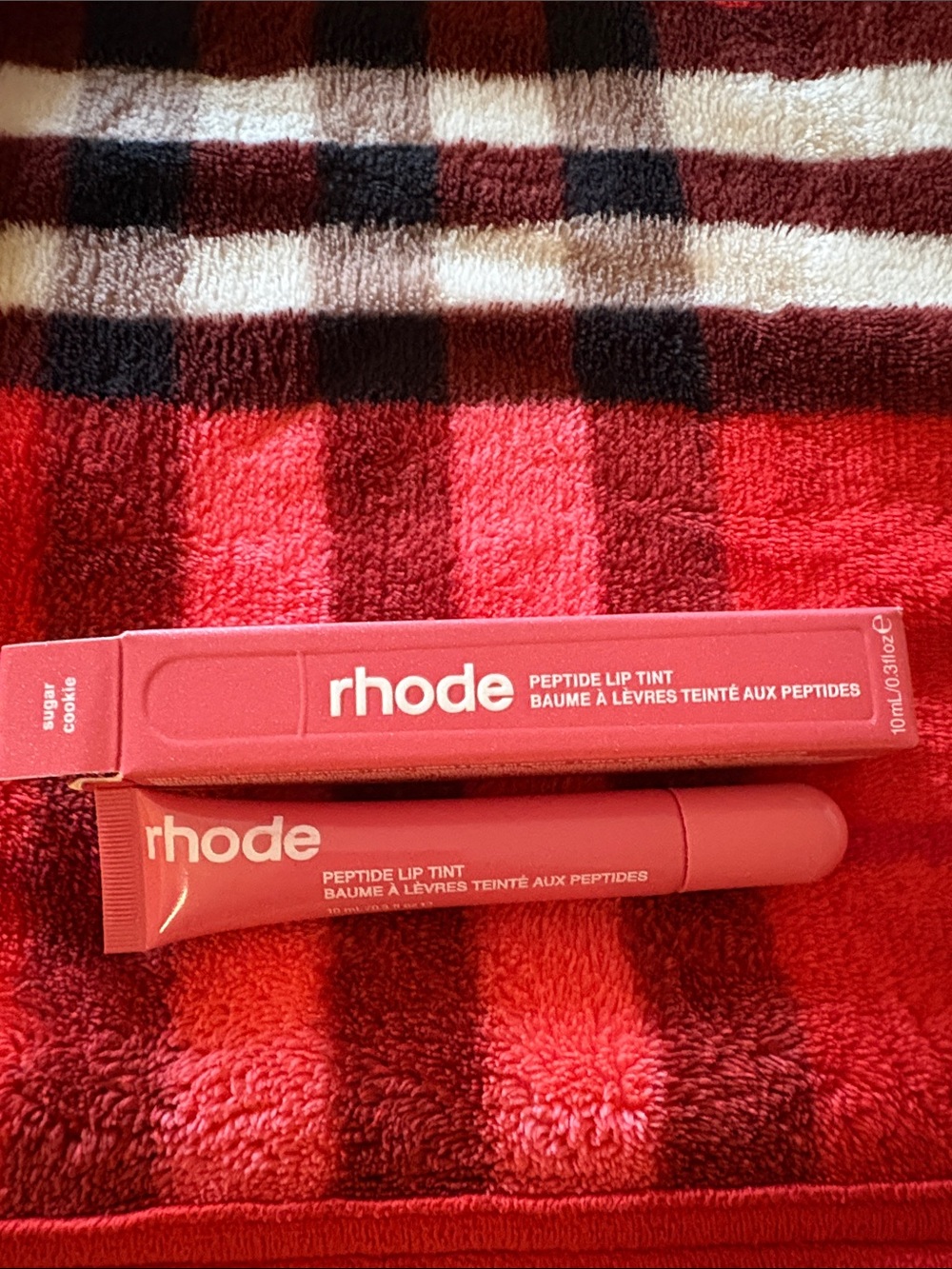 RHODE Peptide Lip Tint in Sugar Cookie - Coral Pink